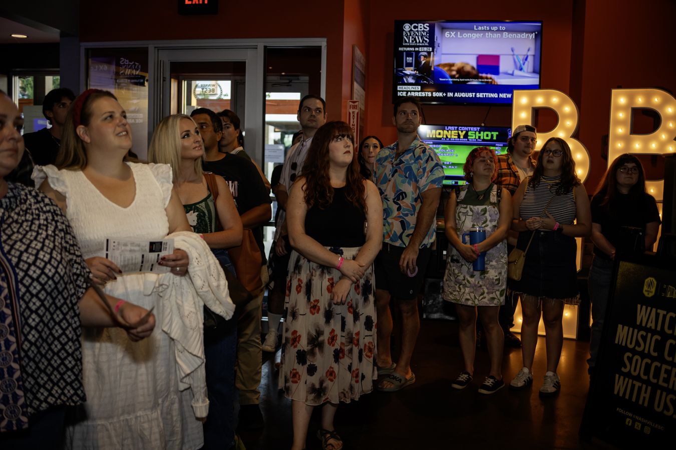 Fans posing at the Nashville watch party